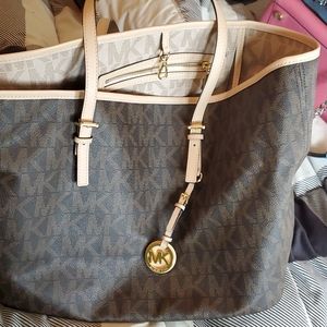 Brown and tan Michael Kors handbag